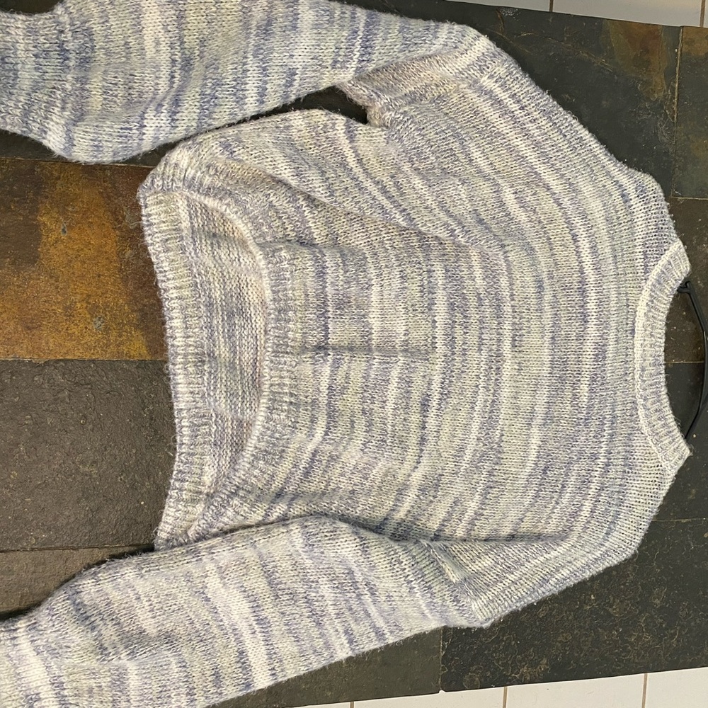 knitted white, grey, and light blue sweater